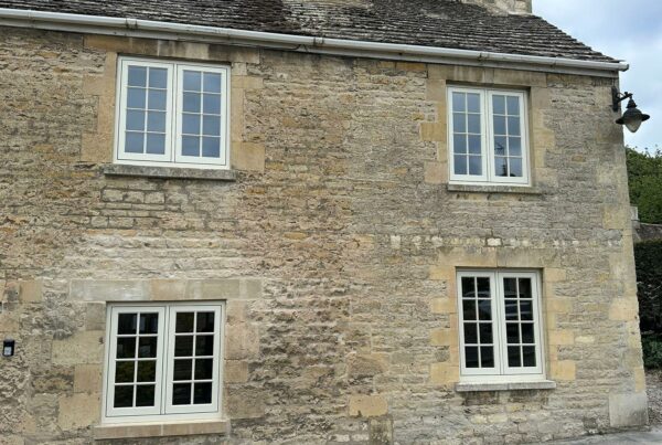 4 georgian casement windows on a stone building