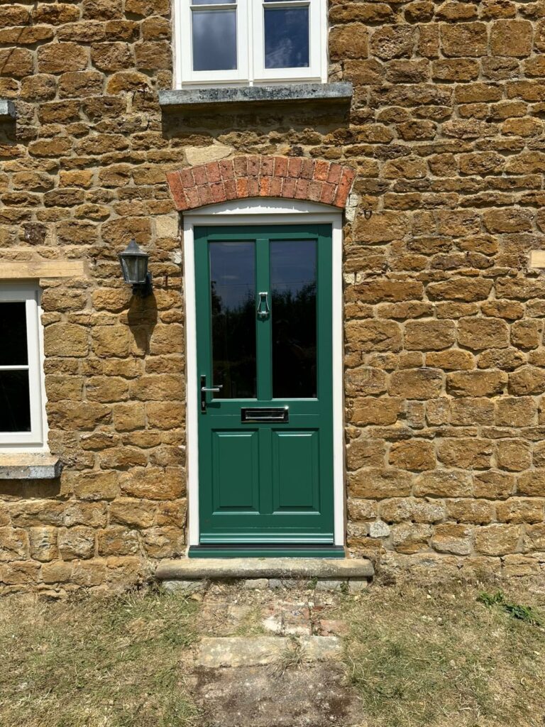 a green victorian front door