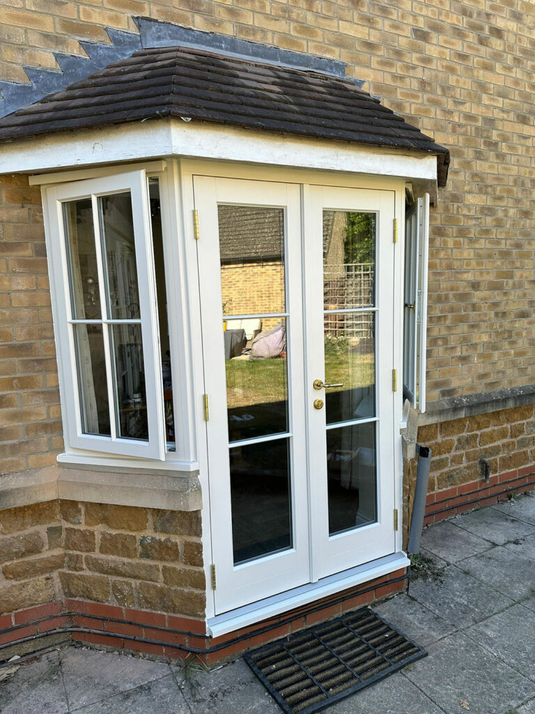 a french door bay with casement windows