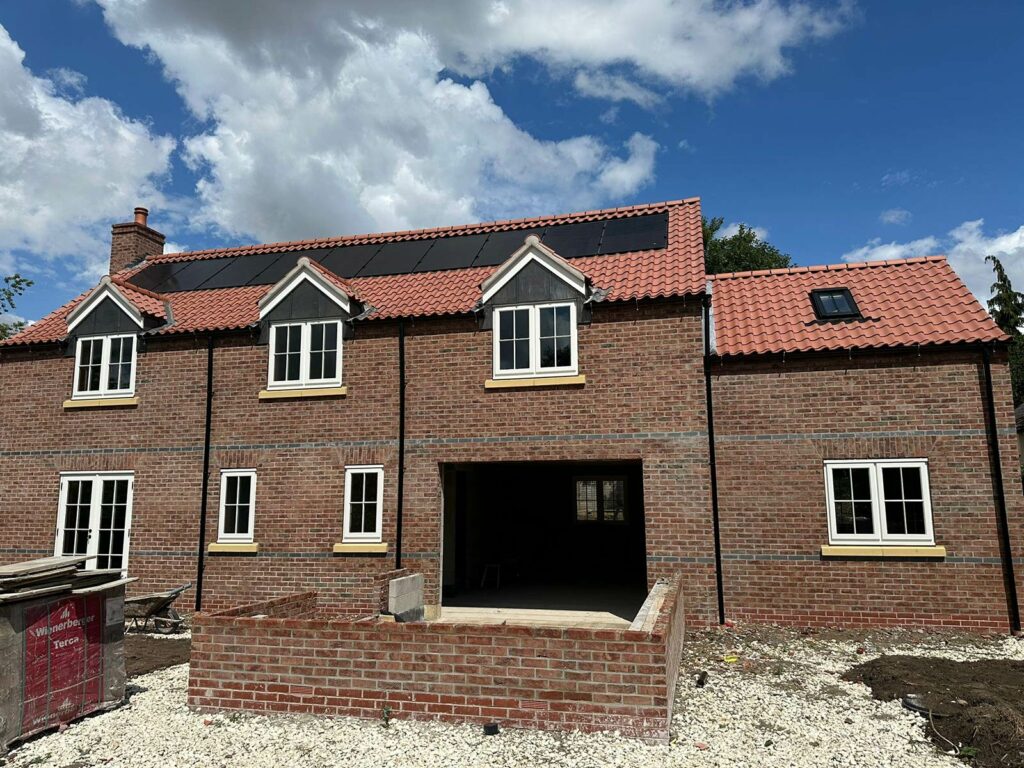 the rear of a newly built home on a building site