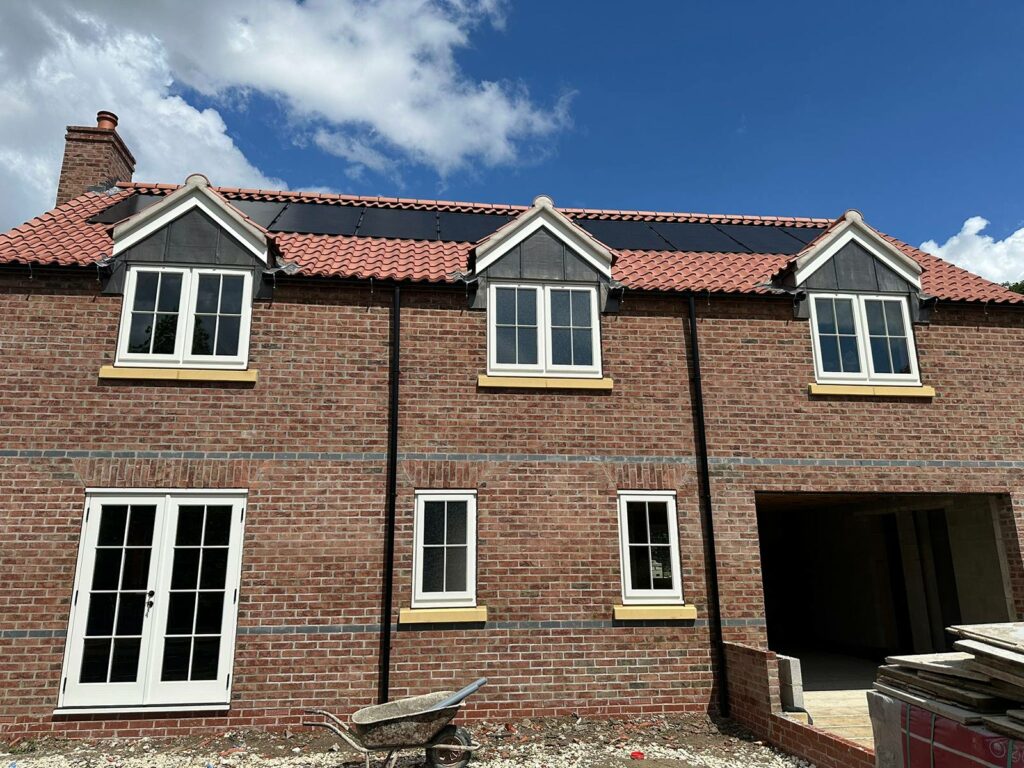 the rear of a newly built home on a building site