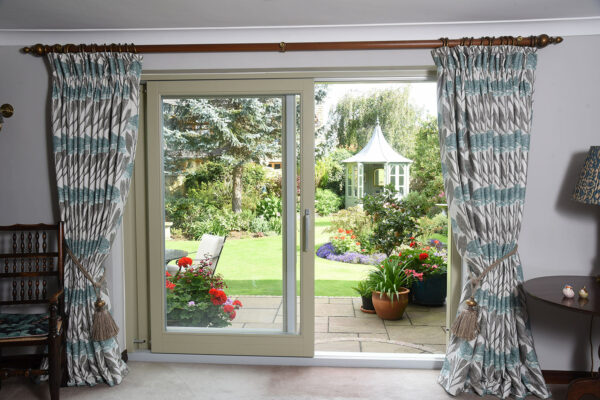 an open set of timber sliding patio doors