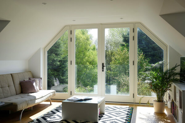 a bespoke set of french doors with arched sidelights