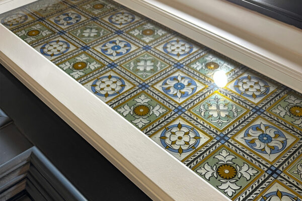 a door toplight with a victorian etched glass pattern