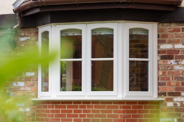 storm proof casement window bay with swept heads