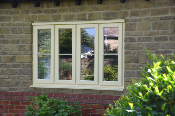 a quadruple set of lipped casement windows