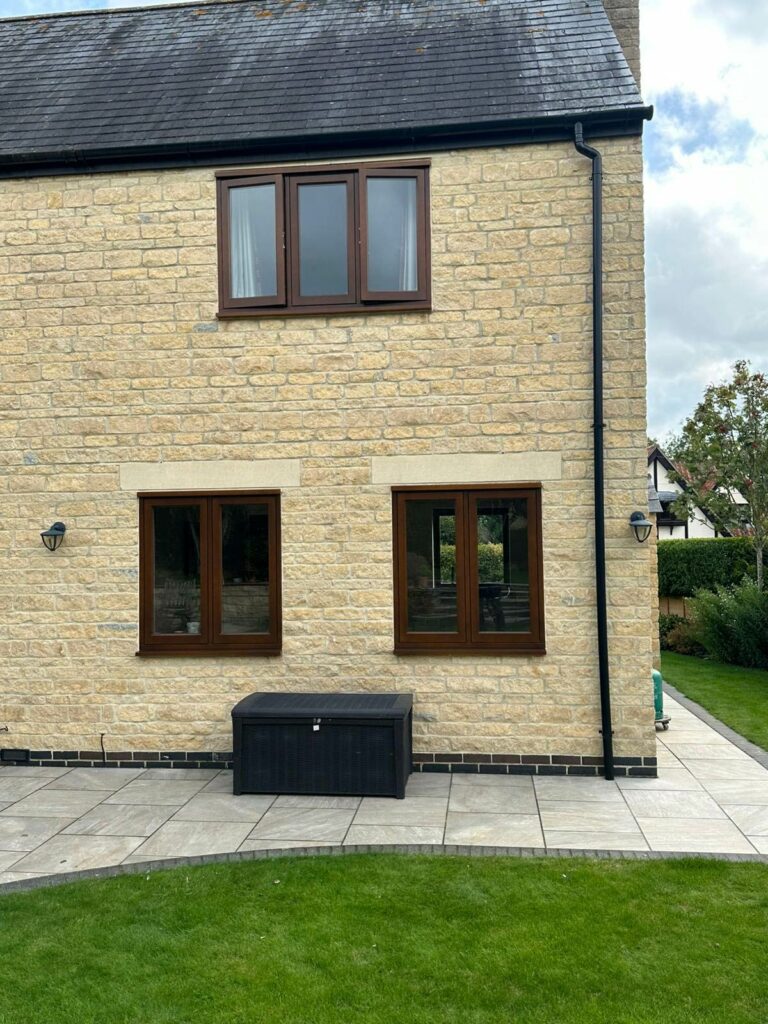 cyprys stained timber windows on a stained property