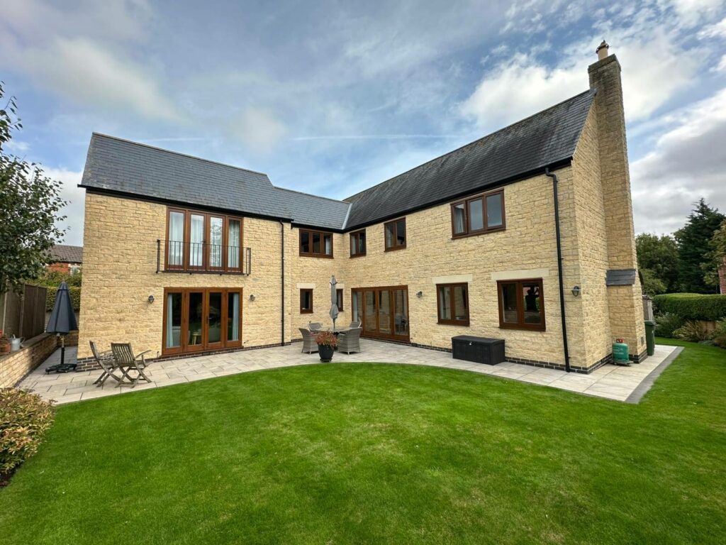 cyprys stained timber windows on a stained property