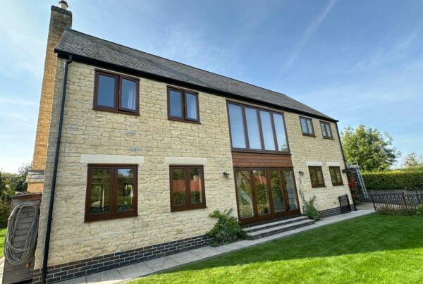 cyprys stained timber windows on a stained property