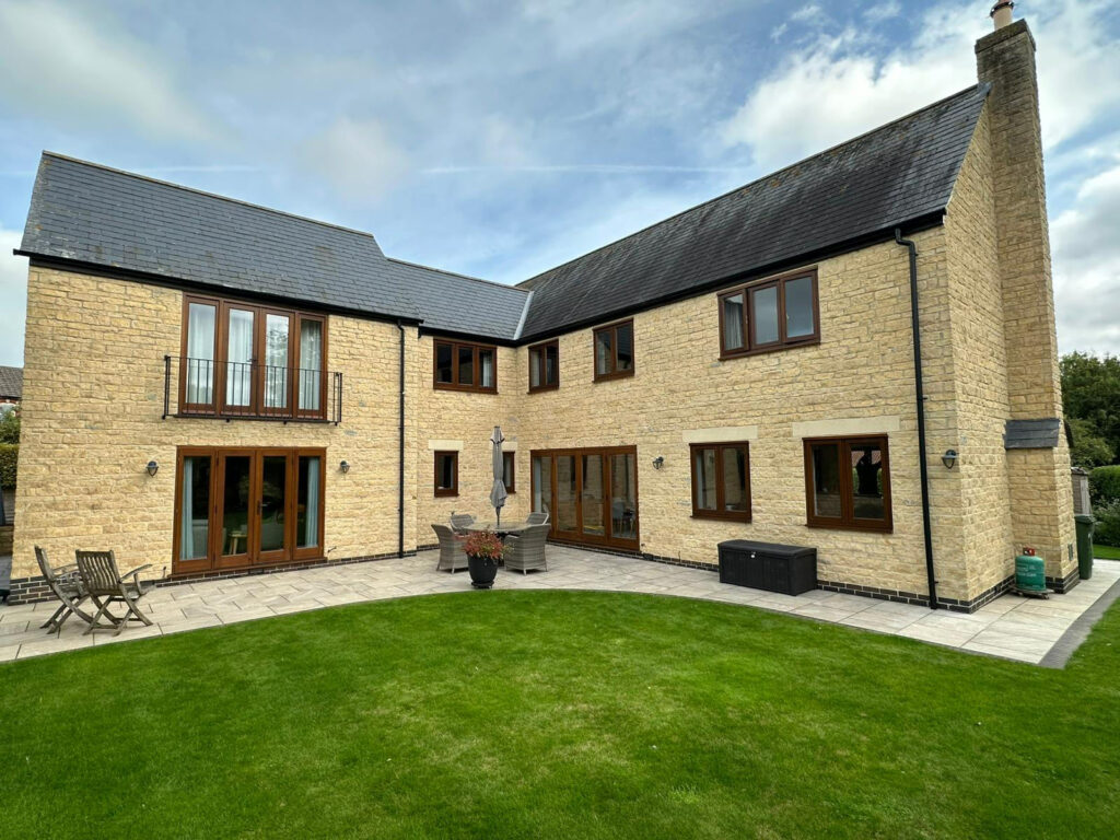 cyprys stained timber windows on a stained property