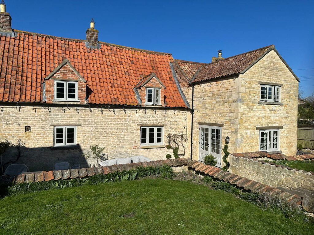 a large countryside home with new casement windows
