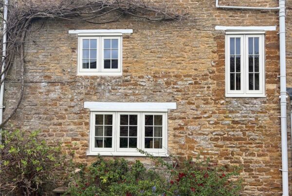 white windows with georgian bars on the side of a house